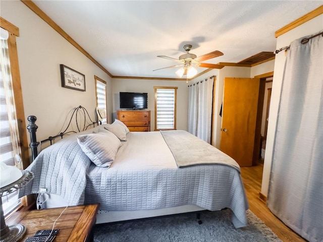 16781 E 1600th Ave, Palestine, IL 62451 - bedroom featuring crown molding, wood finished floors, and a ceiling fan