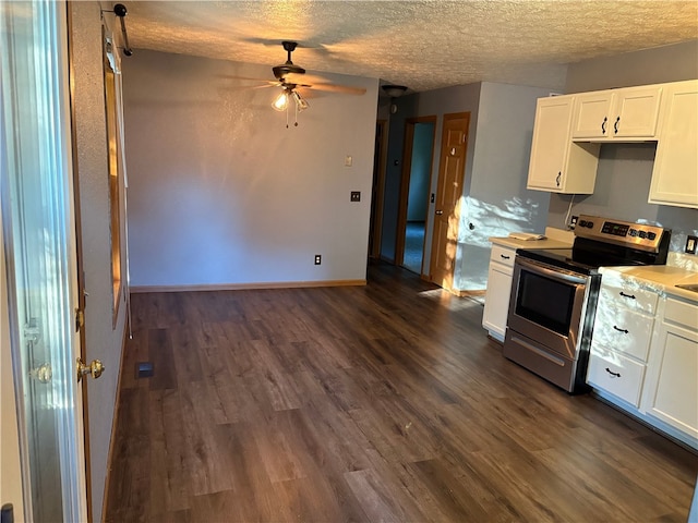905 Oak St, Edgewood, IL 62426 - kitchen featuring electric stove, dark wood-type flooring, a ceiling fan, white cabinetry, and a textured ceiling