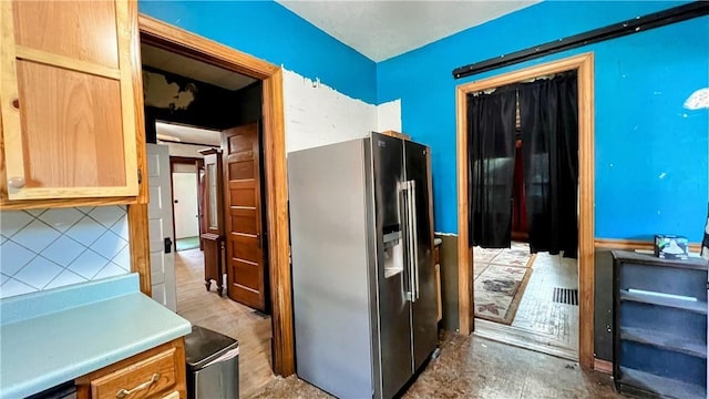 309 N Monroe St, Cerro Gordo, IL 61818 - kitchen featuring stainless steel fridge and light countertops