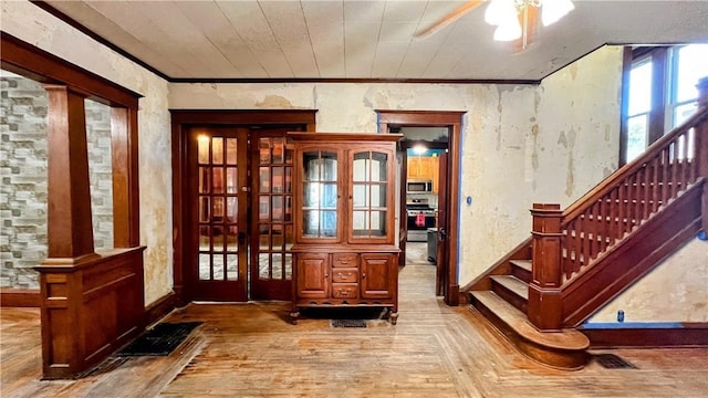 309 N Monroe St, Cerro Gordo, IL 61818 - entrance foyer featuring parquet floors, a ceiling fan, stairway, ornamental molding, and french doors