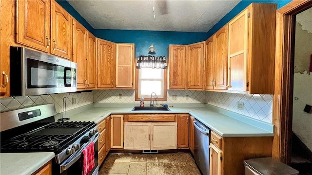 309 N Monroe St, Cerro Gordo, IL 61818 - kitchen with stainless steel appliances, tasteful backsplash, and light countertops