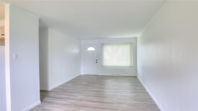 1302 Clement Ave, Forsyth, IL 62535 - entrance foyer featuring wood finished floors and baseboards