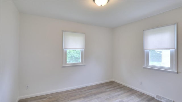 1302 Clement Ave, Forsyth, IL 62535 - empty room featuring light wood-type flooring and baseboards