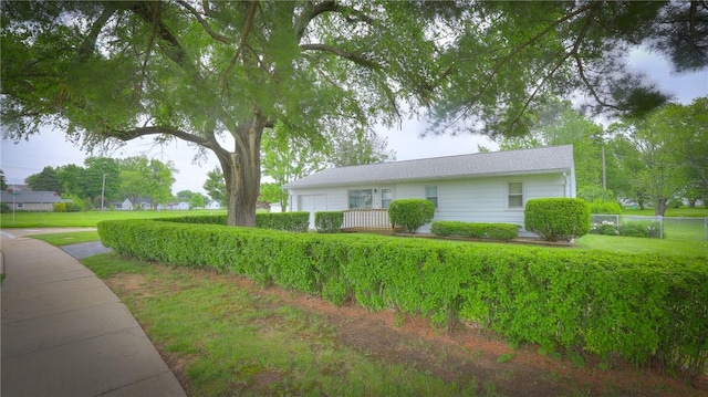 1302 Clement Ave, Forsyth, IL 62535 - view of home's exterior with a garage