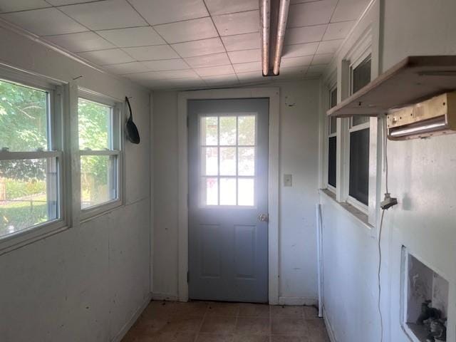 113 S 25th St, Mattoon, IL 61938 - entryway featuring healthy amount of natural light and light tile patterned floors