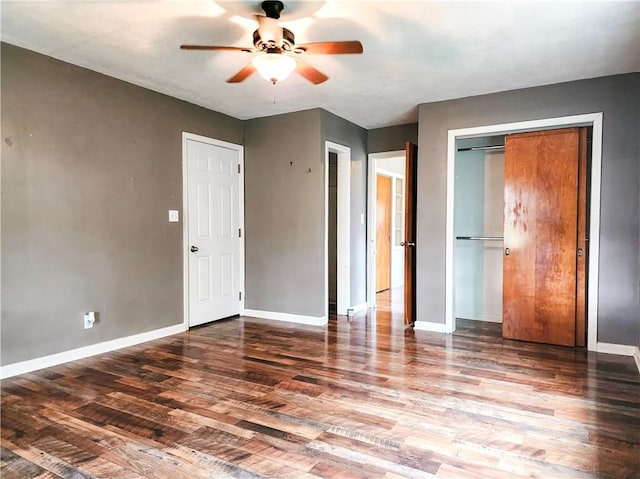89 Pifers Ln, Sullivan, IL 61951 - unfurnished bedroom with wood finished floors and ceiling fan