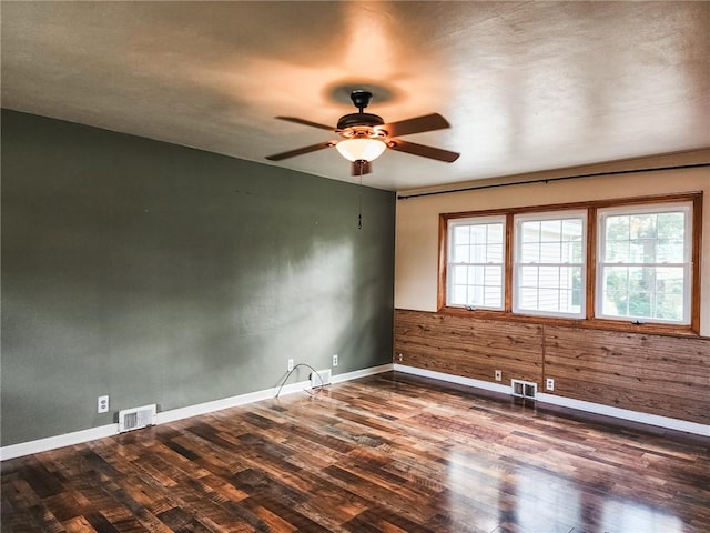 89 Pifers Ln, Sullivan, IL 61951 - spare room with ceiling fan and wood finished floors