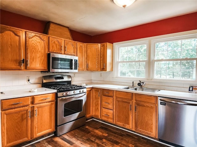 89 Pifers Ln, Sullivan, IL 61951 - kitchen featuring stainless steel appliances, dark wood finished floors, decorative backsplash, and light countertops
