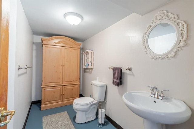 1230 Finley Ave, Mt Zion, IL 62549 - bathroom featuring a sink and finished concrete floors