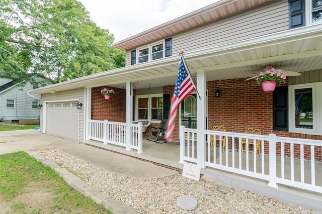1230 Finley Ave, Mt Zion, IL 62549 - view of front of home featuring covered porch, brick siding, and driveway