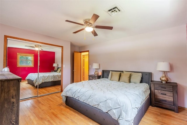 1230 Finley Ave, Mt Zion, IL 62549 - bedroom with wood finished floors, a ceiling fan, and a closet
