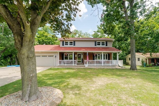 1230 Finley Ave, Mt Zion, IL 62549 - view of front of property featuring a porch, a garage, concrete driveway, a front yard, and brick siding