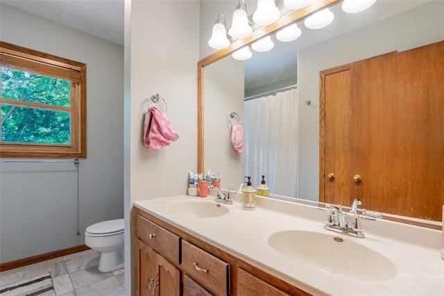 1230 Finley Ave, Mt Zion, IL 62549 - bathroom with double vanity, marble finish floors, and curtained shower