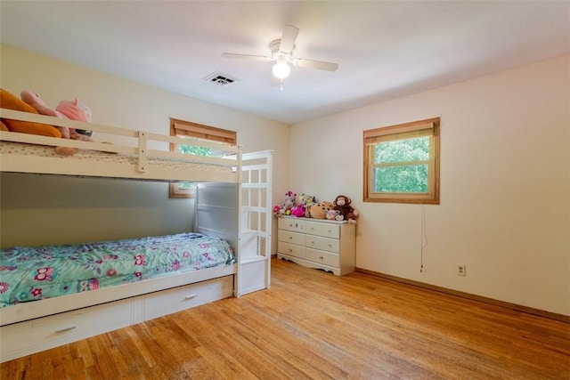 1230 Finley Ave, Mt Zion, IL 62549 - bedroom featuring light wood finished floors and a ceiling fan