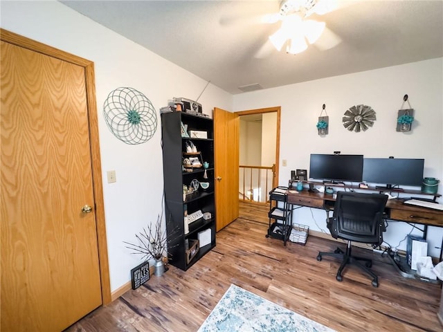 109 Brush Creek Dr, Marshall, IL 62441 - office space with visible vents, baseboards, wood finished floors, and ceiling fan
