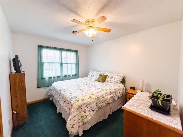 109 Brush Creek Dr, Marshall, IL 62441 - bedroom with dark carpet, a ceiling fan, and baseboards