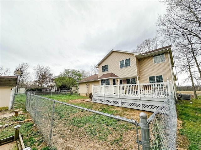 109 Brush Creek Dr, Marshall, IL 62441 - rear view of house with a yard, central AC unit, fence, and a deck