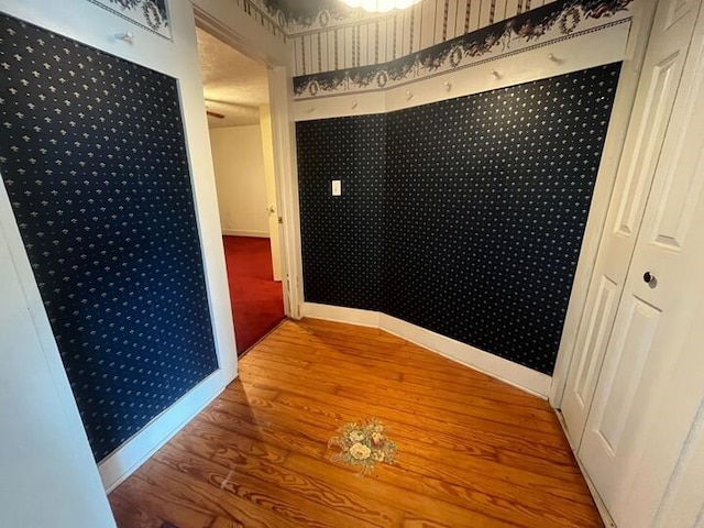 20301 E Darwin Ferry Rd, West Union, IL 62477 - unfurnished dining area featuring wallpapered walls, baseboards, and wood finished floors