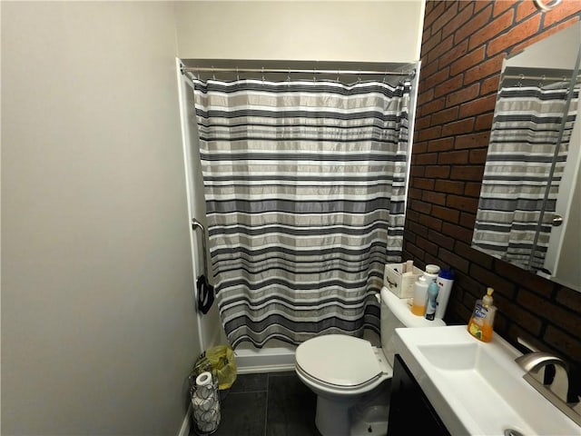 403 11th St, Georgetown, IL 61846 - bathroom featuring brick wall, vanity, toilet, and curtained shower