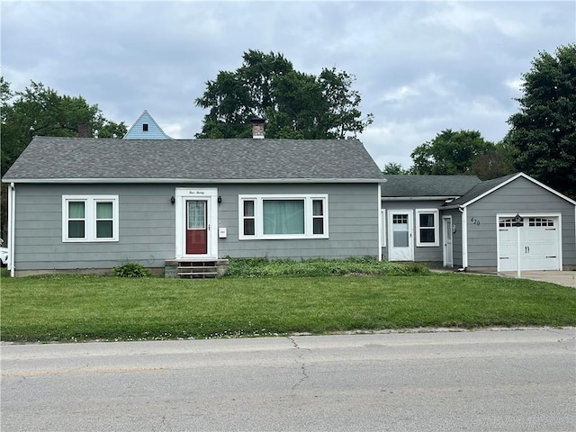 420 N 33rd St, Mattoon, IL 61938 - single story home with a garage, a front lawn, a chimney, and roof with shingles