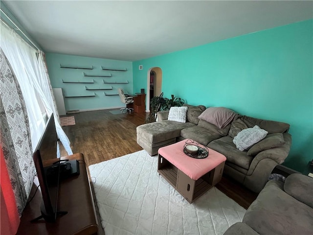 420 N 33rd St, Mattoon, IL 61938 - living area with wood finished floors and arched walkways