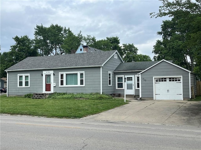 420 N 33rd St, Mattoon, IL 61938 - single story home with a garage, entry steps, a front yard, a shingled roof, and driveway
