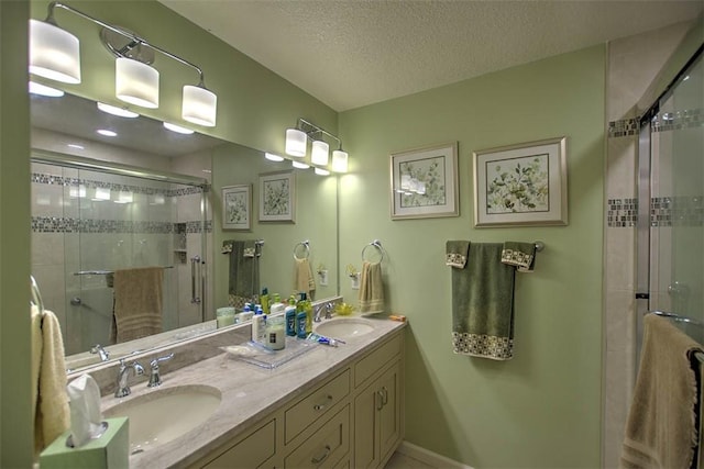5307 Yavapai Dr, Forsyth, IL 62535 - full bathroom featuring double vanity, a stall shower, and a textured ceiling