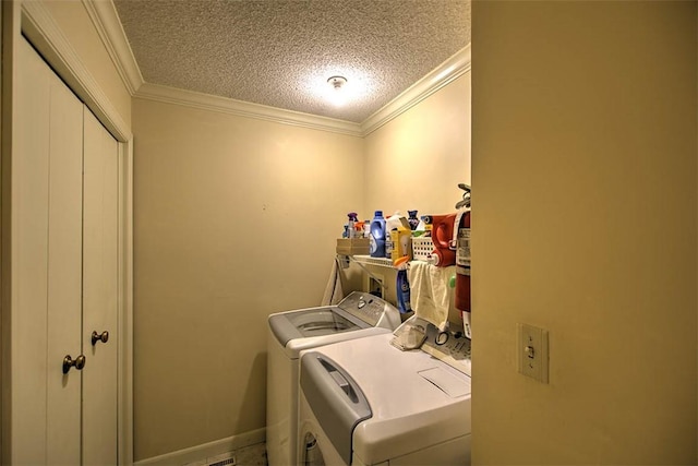 5307 Yavapai Dr, Forsyth, IL 62535 - laundry room with washer and dryer, crown molding, and a textured ceiling