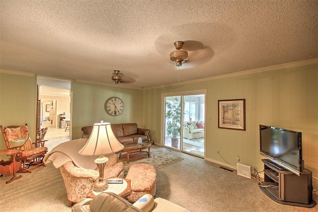 5307 Yavapai Dr, Forsyth, IL 62535 - living area with ceiling fan, crown molding, carpet floors, and a textured ceiling