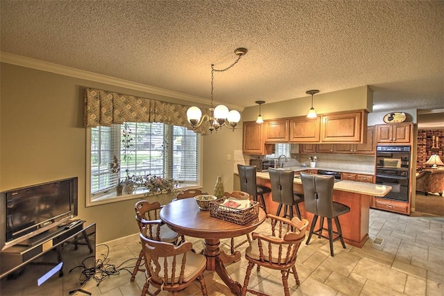 5307 Yavapai Dr, Forsyth, IL 62535 - dining area with ornamental molding, a textured ceiling, and a chandelier