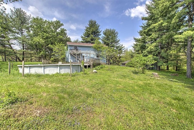 2752 N Sangamon Rd, Decatur, IL 62521 - view of yard with an outdoor pool and a deck