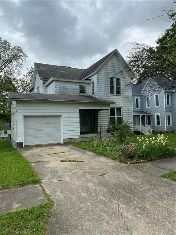 front of property featuring a garage