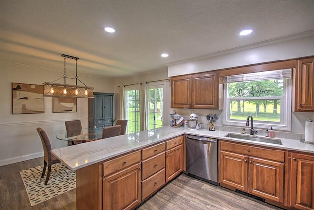 5354 N Macarthur Rd, Forsyth, IL 62535 - kitchen with stainless steel dishwasher, a peninsula, plenty of natural light, brown cabinetry, and ornamental molding
