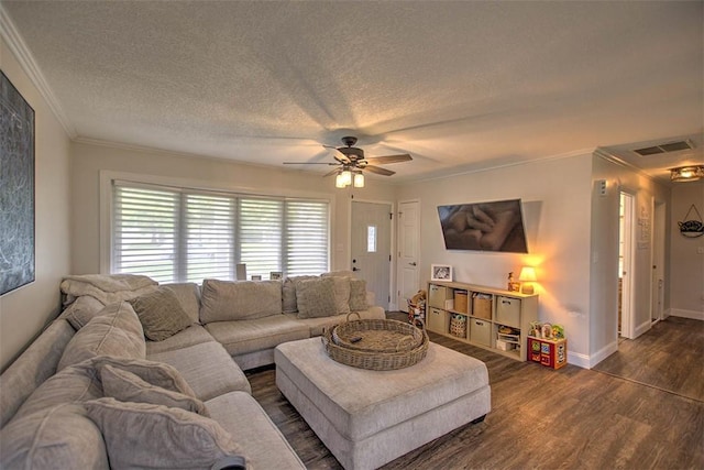 5354 N Macarthur Rd, Forsyth, IL 62535 - living area featuring crown molding, dark wood finished floors, a ceiling fan, and a textured ceiling