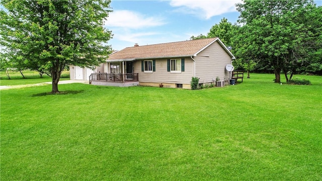 2145 E 1500 N Rd, Shelbyville, IL 62565 - rear view of house featuring a yard, driveway, and a garage