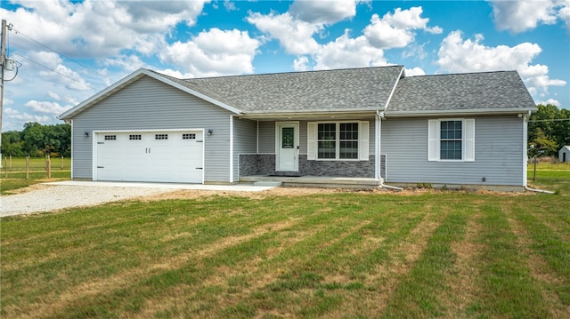 single story home with a garage and a front yard