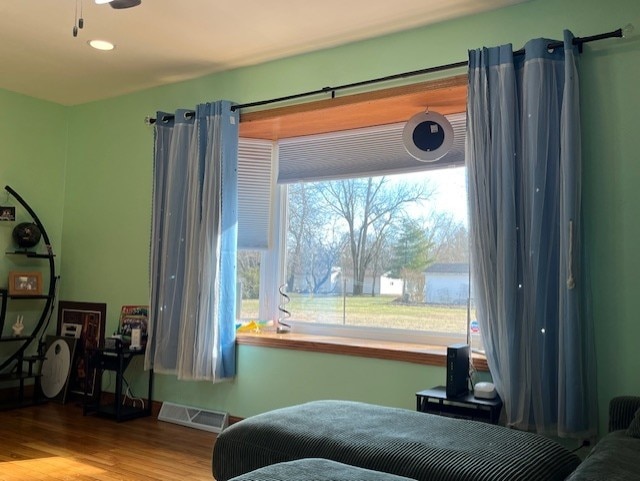 bedroom with light hardwood / wood-style floors