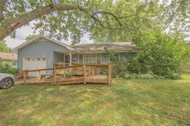 1104 N 30th St, Mattoon, IL 61938 - view of front facade with a garage, a front lawn, and a deck