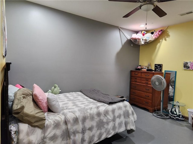 1422 Ohio Ave, Windsor, IL 61957 - bedroom with finished concrete floors and a ceiling fan