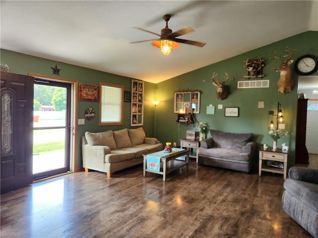 1422 Ohio Ave, Windsor, IL 61957 - living area with lofted ceiling, ceiling fan, and wood finished floors