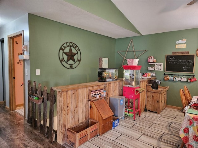 1422 Ohio Ave, Windsor, IL 61957 - recreation room featuring wood tiled floors, vaulted ceiling, and a dry bar