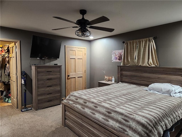 1422 Ohio Ave, Windsor, IL 61957 - carpeted bedroom with a walk in closet, a closet, a ceiling fan, and recessed lighting