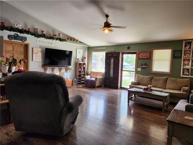 1422 Ohio Ave, Windsor, IL 61957 - living room featuring a ceiling fan, vaulted ceiling, and dark wood-style flooring
