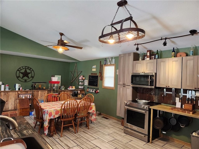 1422 Ohio Ave, Windsor, IL 61957 - dining room featuring vaulted ceiling and ceiling fan