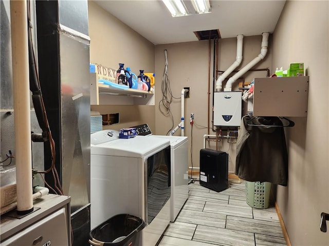 1422 Ohio Ave, Windsor, IL 61957 - washroom with washer and dryer and baseboards