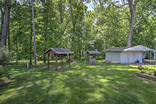 2631 Gregory Ct, Decatur, IL 62526 - view of green lawn featuring an outbuilding