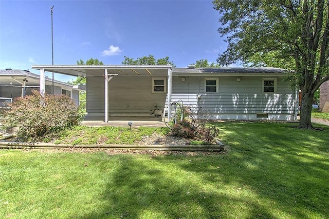 2631 Gregory Ct, Decatur, IL 62526 - back of property featuring a yard