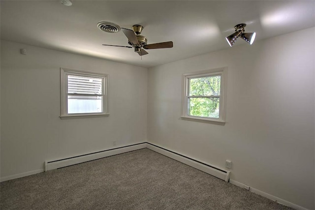 2631 Gregory Ct, Decatur, IL 62526 - empty room with a ceiling fan, carpet, baseboard heating, and baseboards
