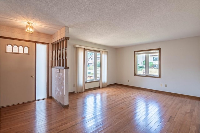 4642 Dogwood Ct, Decatur, IL 62526 - entryway with a textured ceiling and wood finished floors