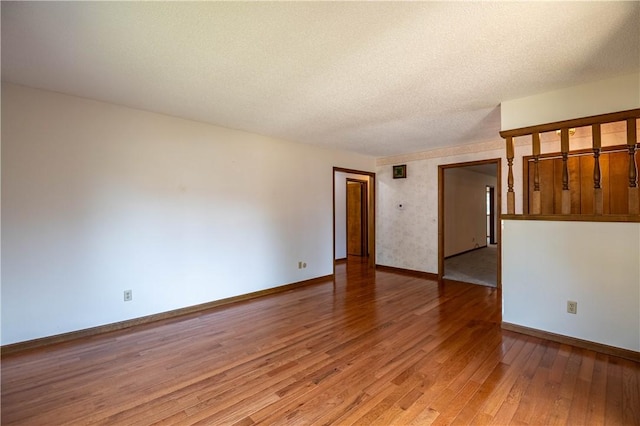 4642 Dogwood Ct, Decatur, IL 62526 - unfurnished room with baseboards and light wood finished floors